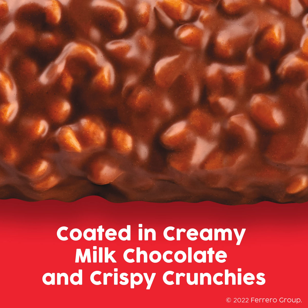 Close-up of 100 Grand wrap, showing crisp caramel and milk chocolate texture.
