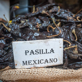 1400s Spices pasilla negro for mole sauce and rich chili flavors.