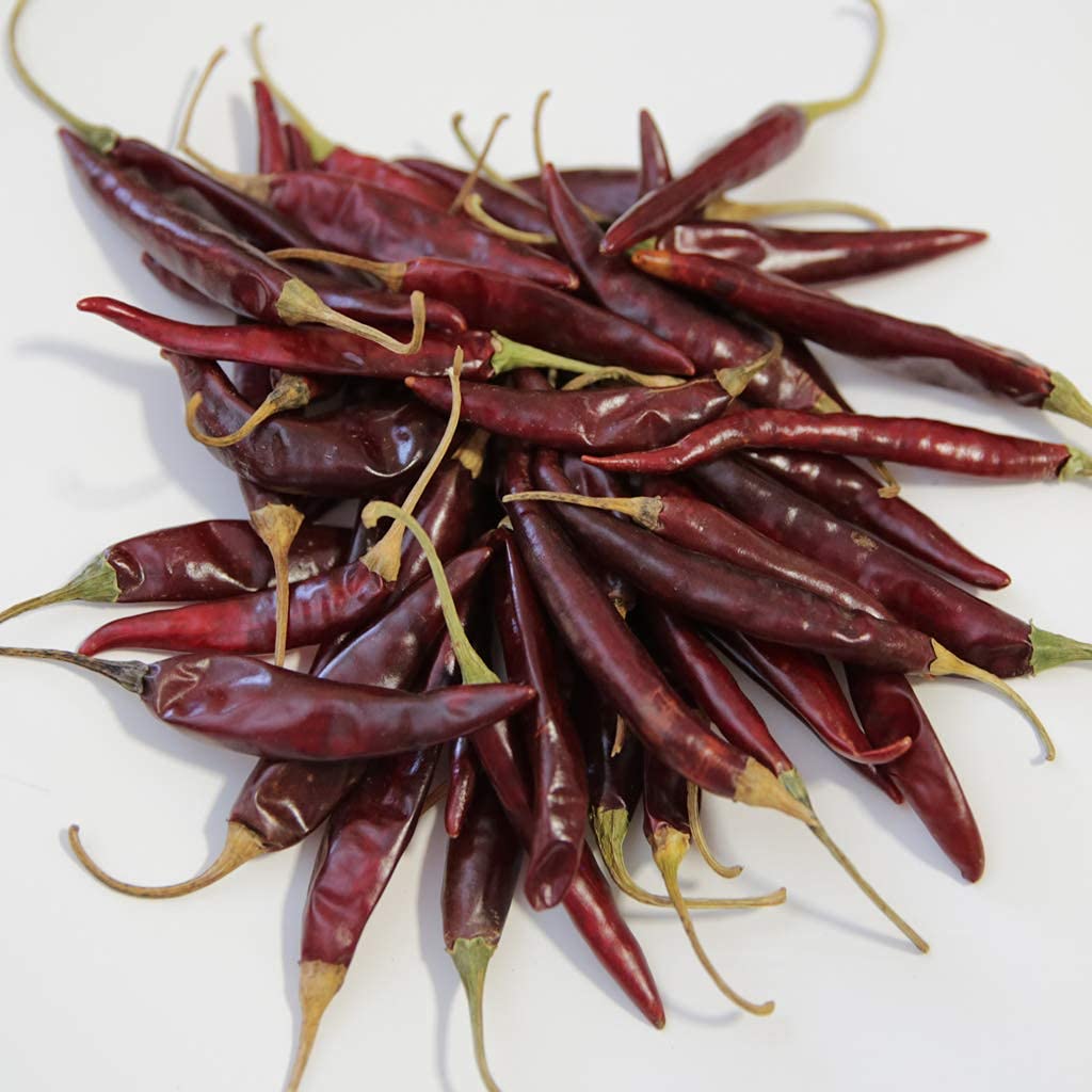 Puya dried peppers closeup from 1400S Spices, adding medium heat with fruity notes.