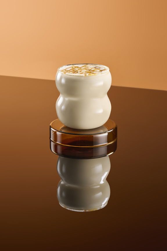 Dessert topping using 1883 caramel syrup to finish treats.