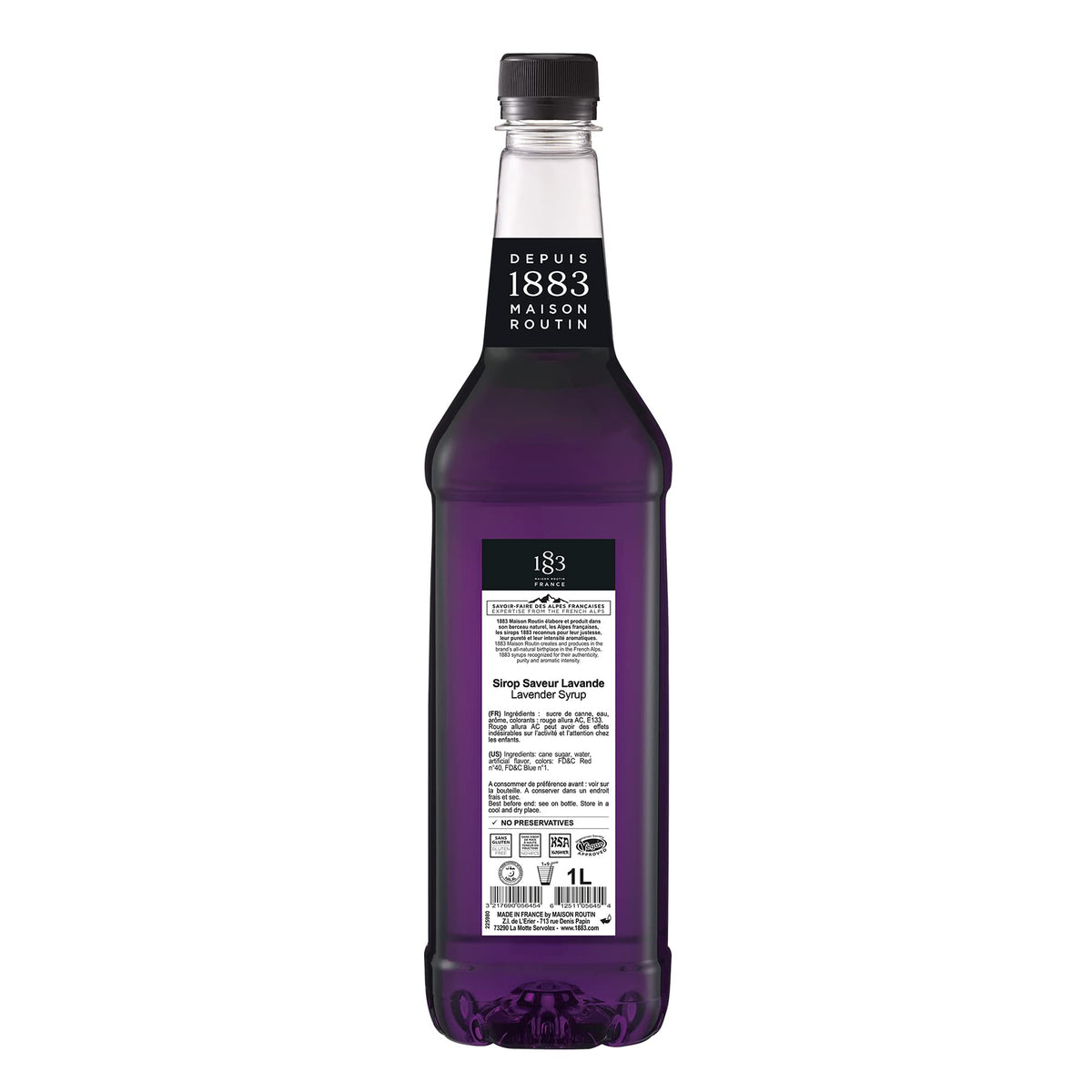 Pouring 1883 MAISON ROUTIN Lavender Syrup into a glass for drinks