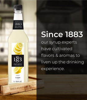 1L packaging of 1883 MAISON ROUTIN lemon syrup on shelf