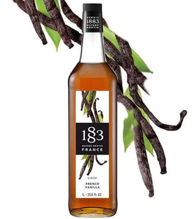 1883 MAISON ROUTIN one-liter bottle highlighted for convenient home bar use.
