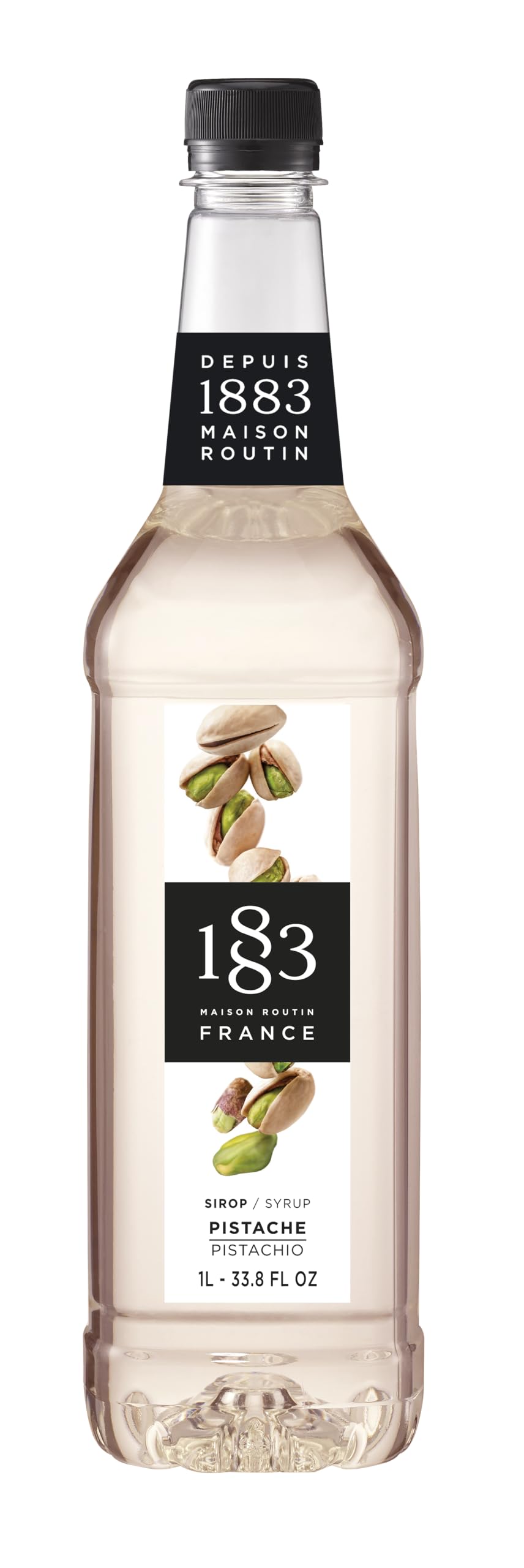 1883 Pistachio Syrup bottle being poured for coffee and cocktails