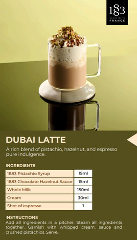 1883 Pistachio Syrup in a coffee cup to enhance lattes