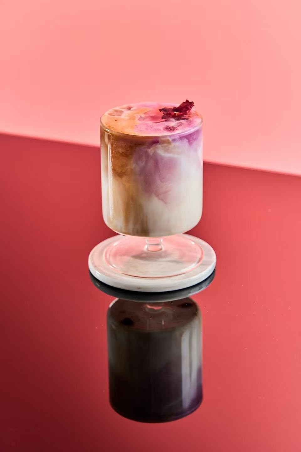 1883 Rose Syrup cocktail creation with vibrant color