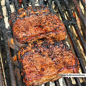 2 Gringos Chupacabra steak seasoning on plated steak ready to serve