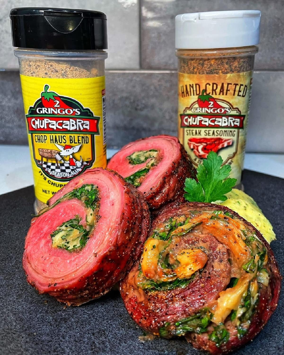 2 Gringos Chupacabra bottle on shelf signals versatile meat seasoning for kitchens.