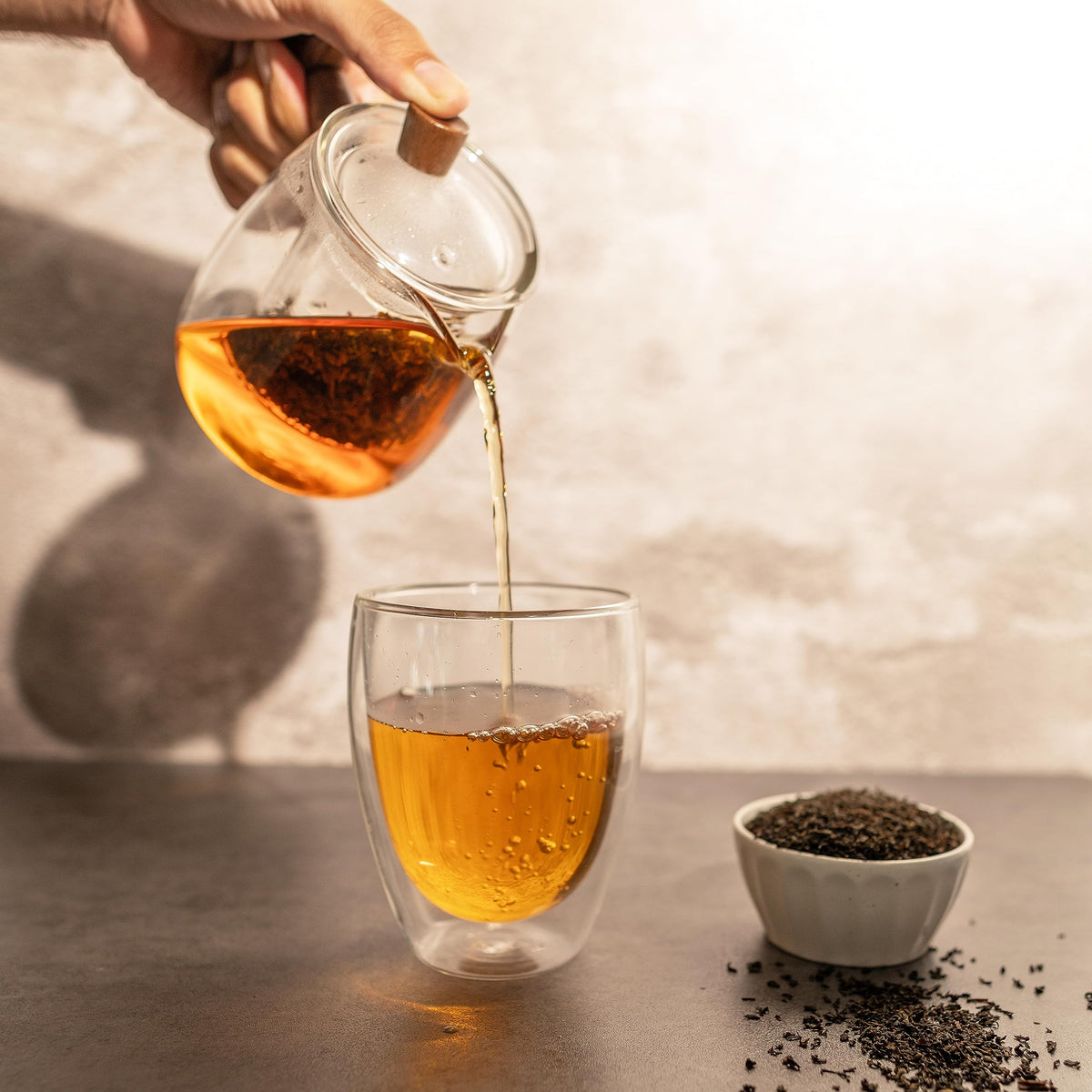 Loose Earl Grey leaves expanding in water signaling rich infusion from 20 Leaves