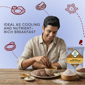 24 Mantra Organic Ragi Flour wooden scoop close-up, ideal for energy-boosting meals.