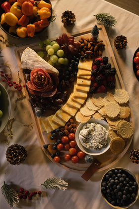 34 Degrees Original Crisps on a cheese board with charcuterie.