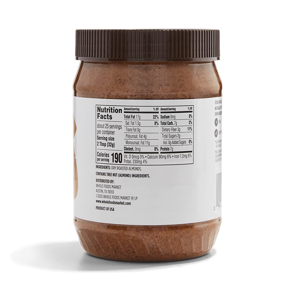 365 by Whole Foods Market almond butter texture close-up, smooth and spreadable for toast.