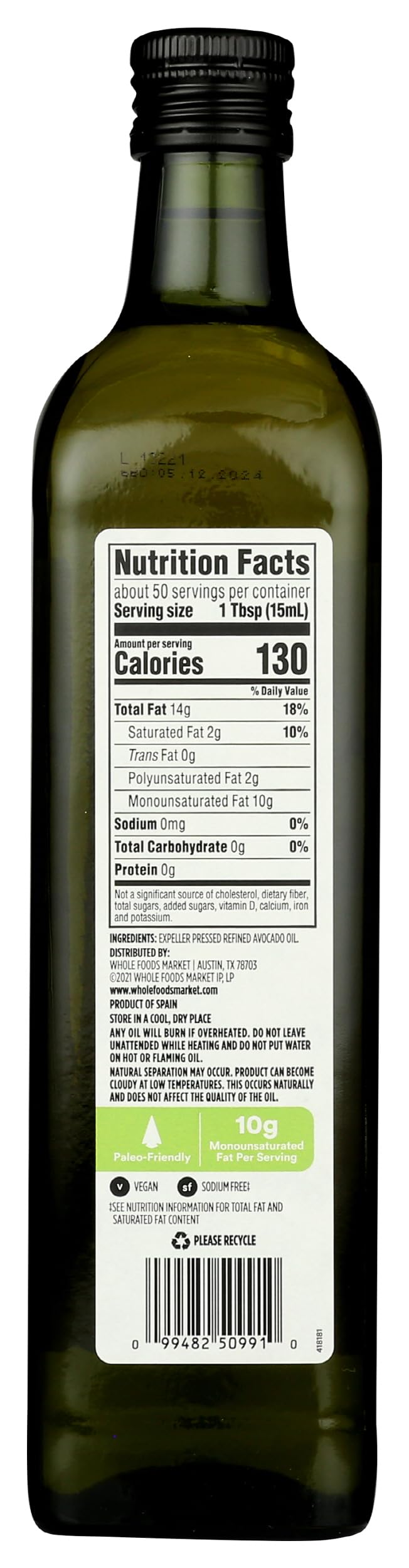 Pouring 365 by Whole Foods Market avocado oil for cooking