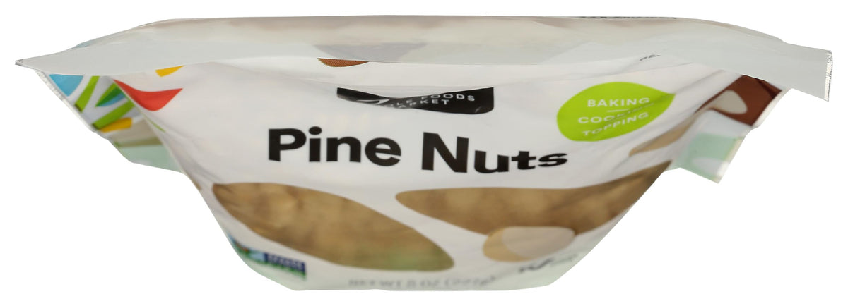 Closeup of 365 unsalted pine nuts, perfect for cooking and snacking.