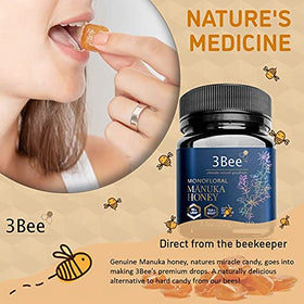 3Bee Manuka honey drops close-up of ginger lemon label and MGO marking.