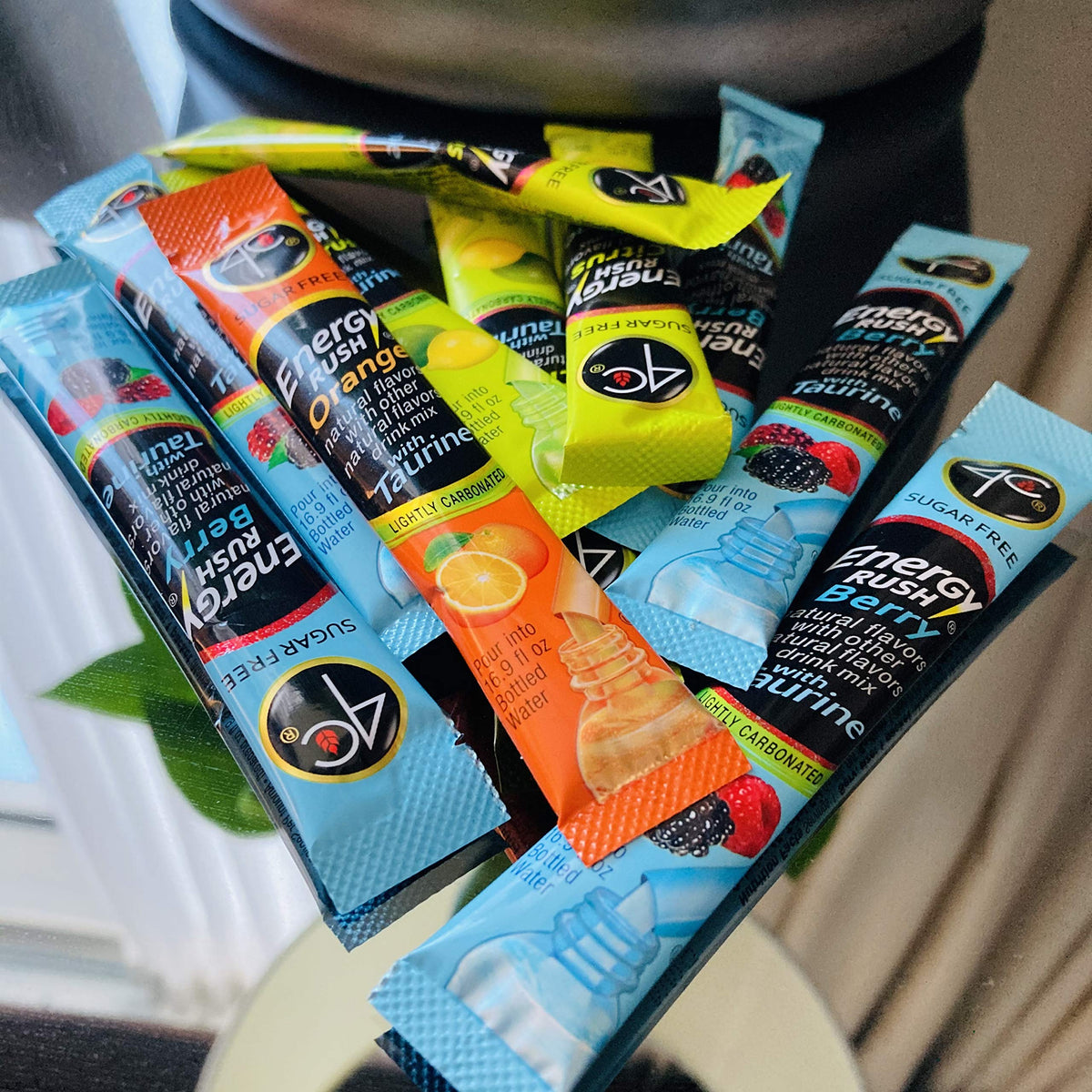 4C Energy Rush Stix orange flavor sachets with sugar-free option.