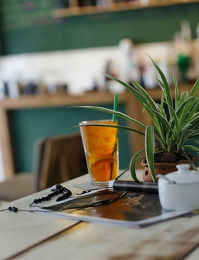 Glass of ice-cold Raspberry Tea ready to quench thirst
