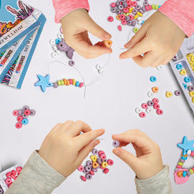 4YoreElves mermaid tail pendant adds sea-inspired charm to bracelets.