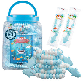4YoreElves shark candy bracelets in a display tub for under-the-sea party favors.