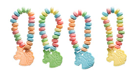 4YoreElves unicorn party table centerpiece featuring candy bracelets.