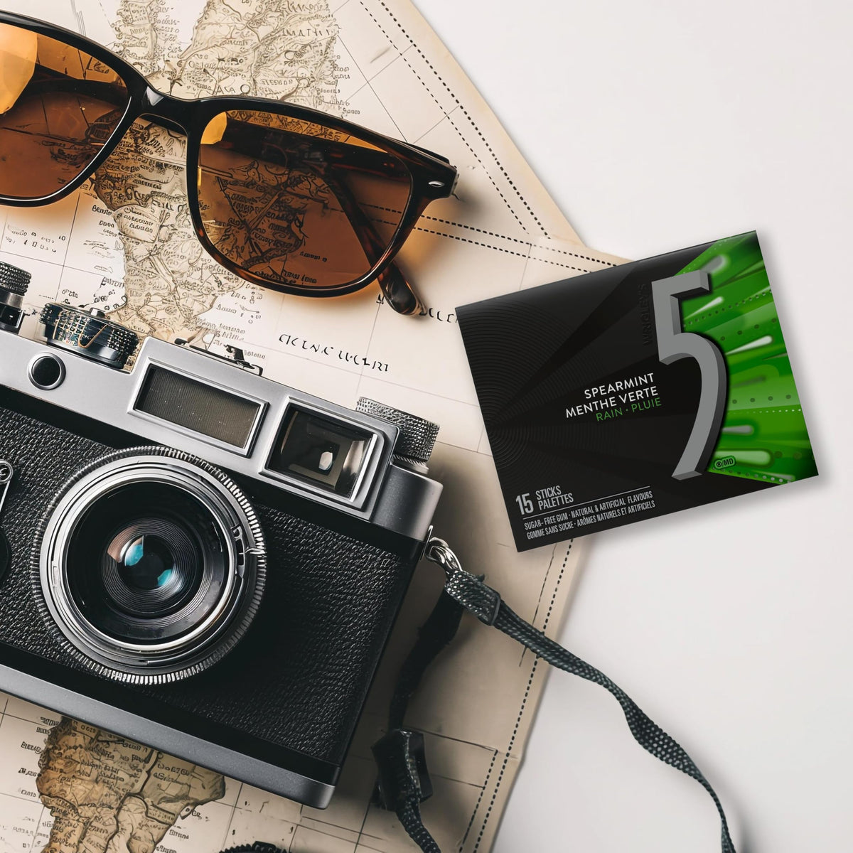 5 Gum Rain-Tingling Spearmint travel scene offers portable freshness.