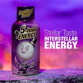 5-hour ENERGY Purpleberry Punch shot bottle on desk offers quick energy on the go