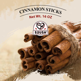 Close-up of 52USA cinnamon sticks highlighting natural texture for cooking.