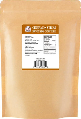 52USA cinnamon sticks on a wooden surface showing raw quality.
