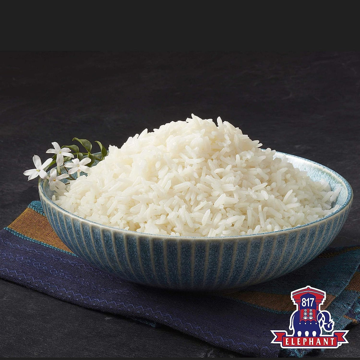 Fragrant steam from 817 Elephant Jasmine Rice ready to brighten curries