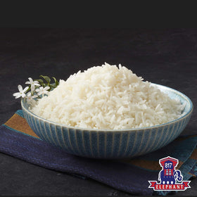 Fragrant steam from 817 Elephant Jasmine Rice ready to brighten curries