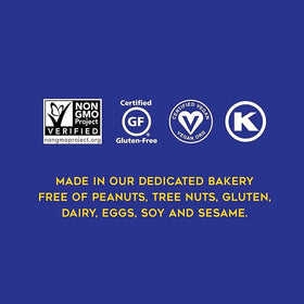 Serving suggestion: sliced bar on plate with blueberries and lemon zest