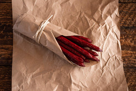 Packaging of Tillamook Country Smoker Original smoked sausages for on-the-go use