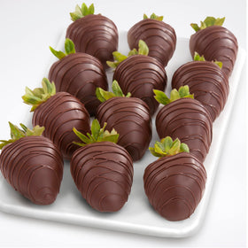 A Gift Inside hand-dipped strawberries with rich drizzle, perfect dessert centerpiece