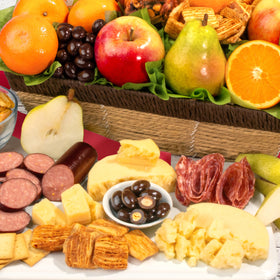 A Gift Inside charcuterie selection with salami, Gouda, and mustard for a ready-to-share board.