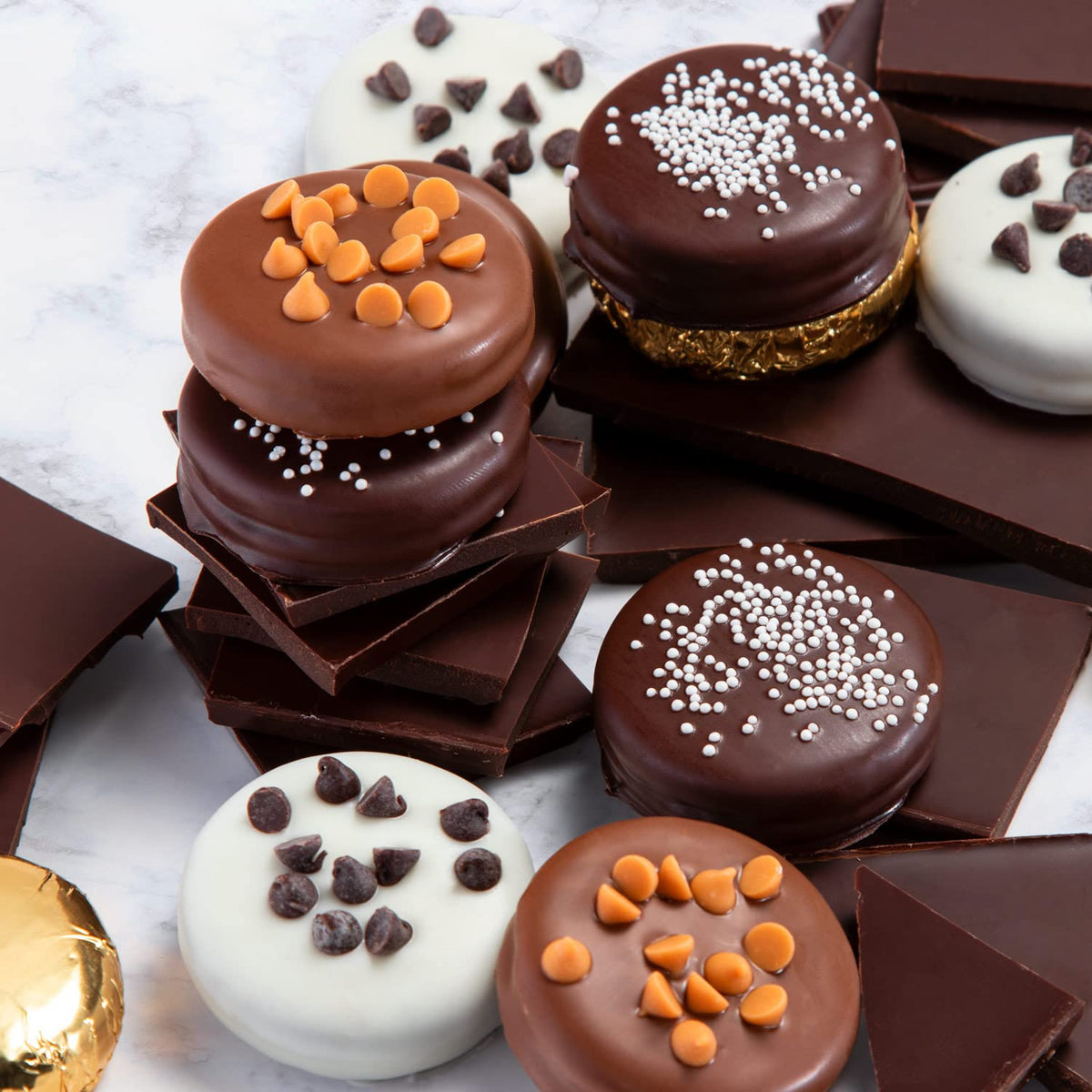 A Gift Inside Deluxe Oreos white-dipped cookies with toppings, ideal for celebrations
