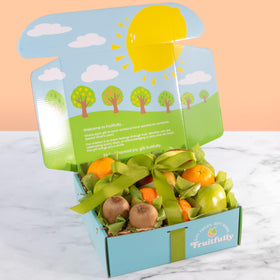 A Gift Inside fruit basket with bow ready to gift