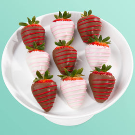 A Gift Inside Love Bites strawberries white dip—elegant sweet treat for gifting.