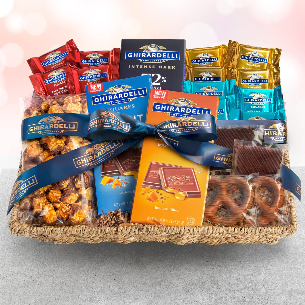Milk chocolate covered pretzels and dark-drizzled caramel popcorn by Ghirardelli.