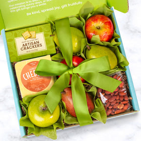 A Gift Inside Gouda and crackers arrangement highlighting savory pairings for entertaining
