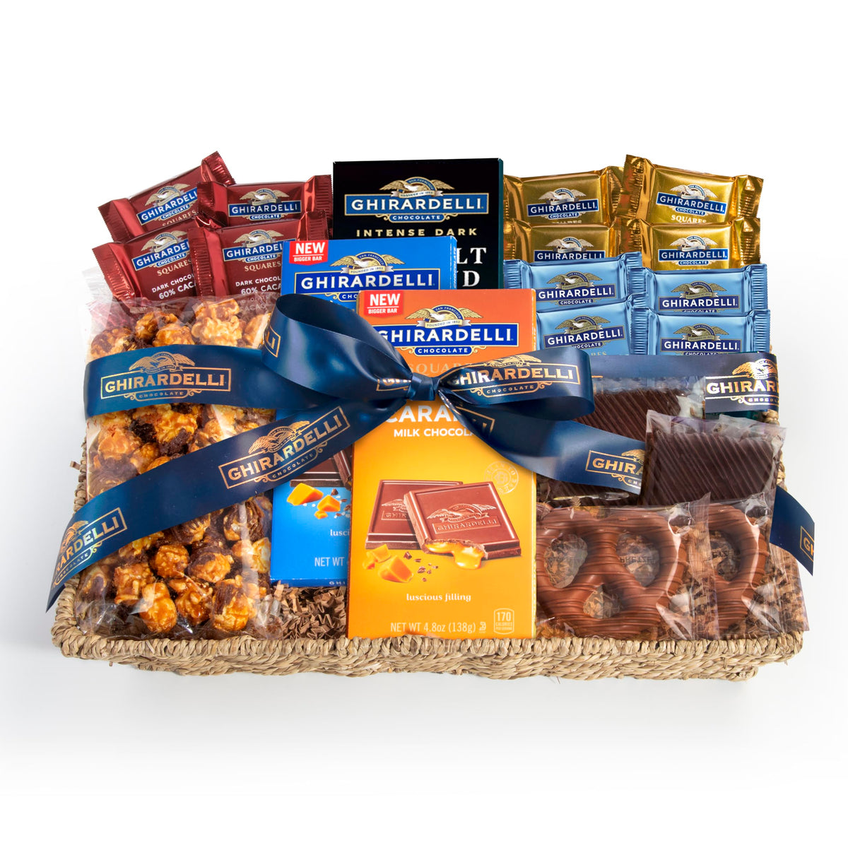 A Gift Inside Signature Ghirardelli Gift Basket in a keepsake seagrass basket for celebrations.