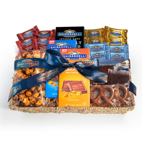 A Gift Inside Signature Ghirardelli Gift Basket in a keepsake seagrass basket for celebrations.