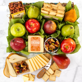 A Gift Inside Sympathy basket features orchard fruit varieties for a fresh, thoughtful gesture.
