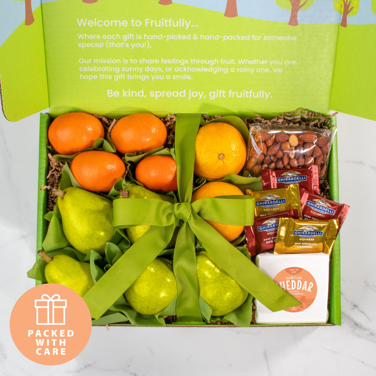 A Gift Inside vanilla caramels wrapped in wax paper beside the eco box