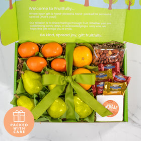 A Gift Inside vanilla caramels wrapped in wax paper beside the eco box