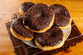 A Great Surprise chocolate sprinkles for cake decorating adding color and texture.