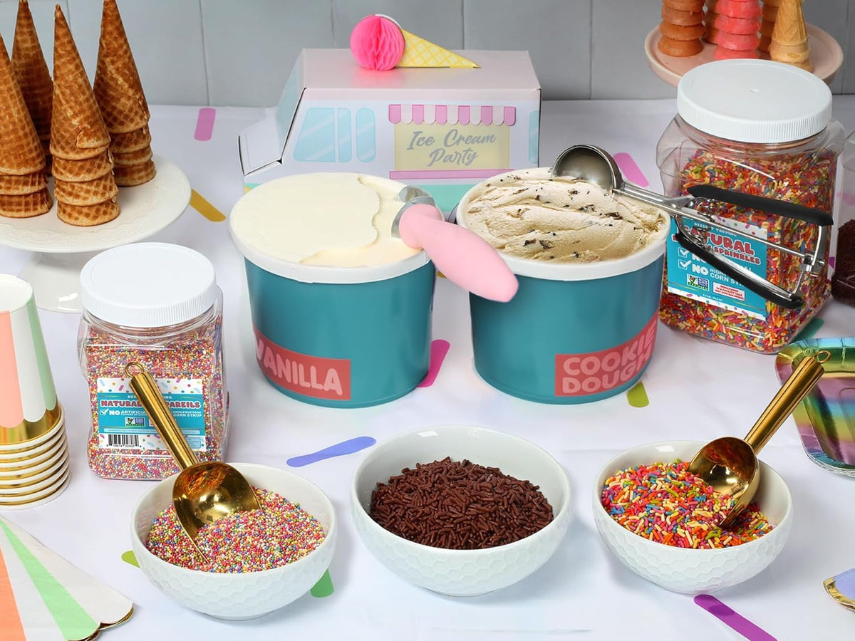 A Great Surprise cupcakes topped with rainbow sprinkles for a cheerful look.