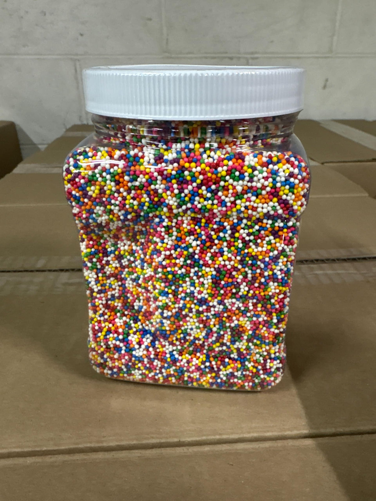 A Great Surprise Rainbow Nonpareil Sprinkles brighten cakes with shine