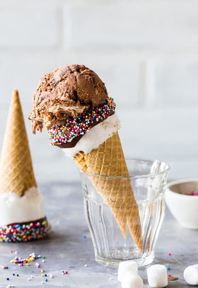 A Great Surprise rainbow nonpareils add texture and color to baked treats