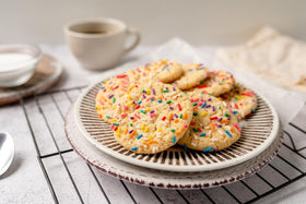 Cupcakes finished with A Great Surprise Rainbow Sprinkles for eye-catching tops