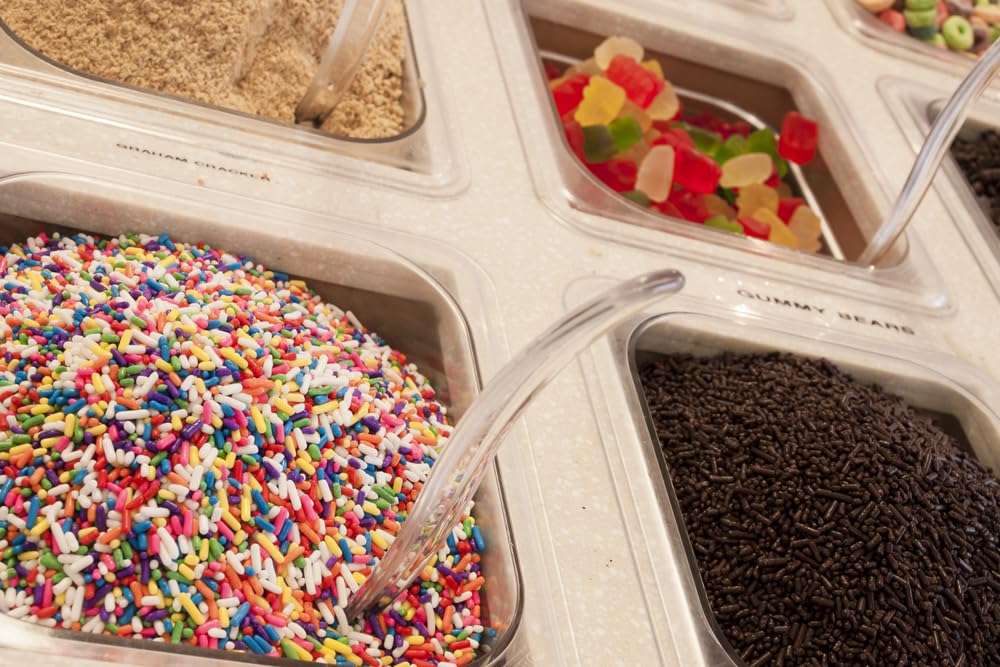 A Great Surprise Rainbow Sprinkles atop cake for festive color and texture